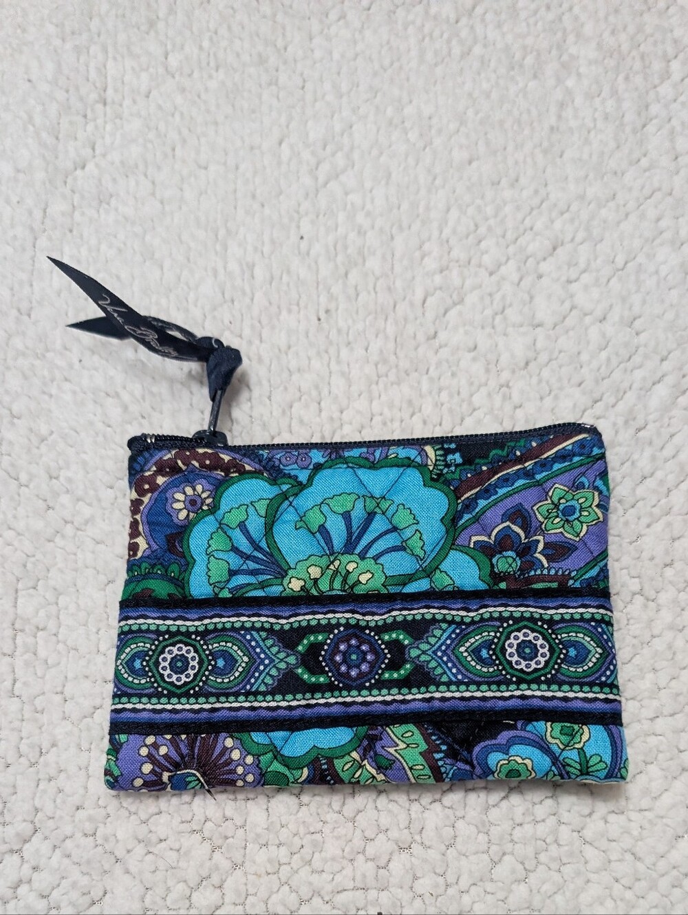 Vera Bradley zip coin purse featuring a multicolor floral and paisley pattern on